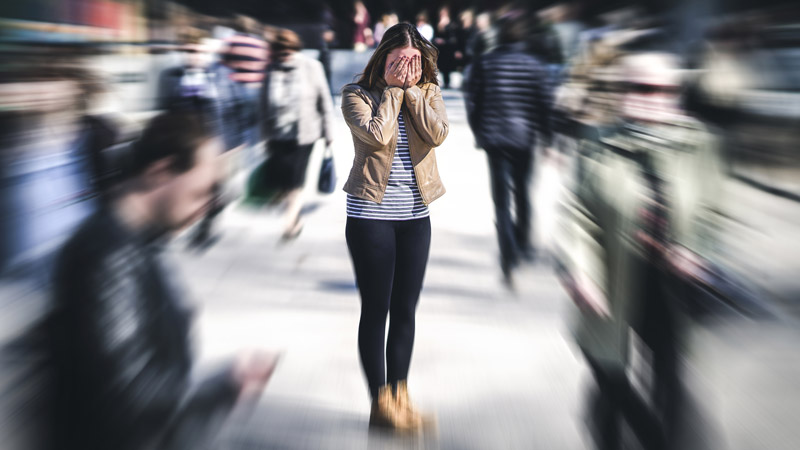 Woman Having Panic Attack in Crowd